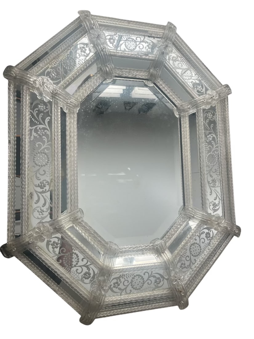 Venetian Wall Mirror in Colorless Murano Glass, Circa 1880: Venetian Wall Mirror in Colorless Murano Glass, Circa 1880 Venetian wall mirror crafted from colorless Murano glass, circa 1880. Features intricate floral etchings and a decorative octagonal frame wit