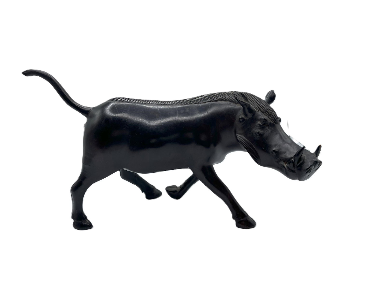 Carved Boar / Warthog - Black Ebony Wood: Carved Boar / Warthog - Black Ebony Wood Dimensions: 13 x 7 in Ships from Palm Springs, CA. An entrepreneur, philanthropist, and activist, Brad Leathers was a native of the greater San Francisco Bay A
