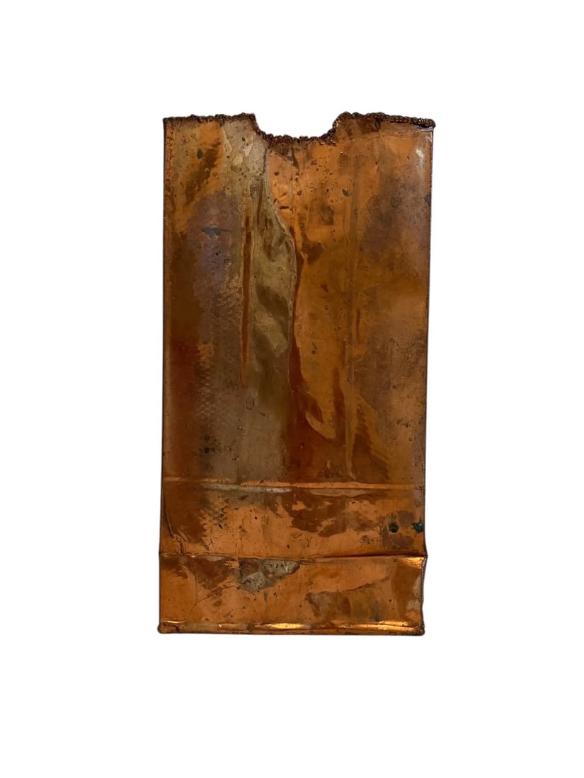 Copper Paper Bag Sculpture Signed: Copper Paper Bag Sculpture A sculptural representation of a crumpled paper bag, cast in bronze with a textured surface. The piece displays a naturalistic approach to form and detail, emphasizing the i