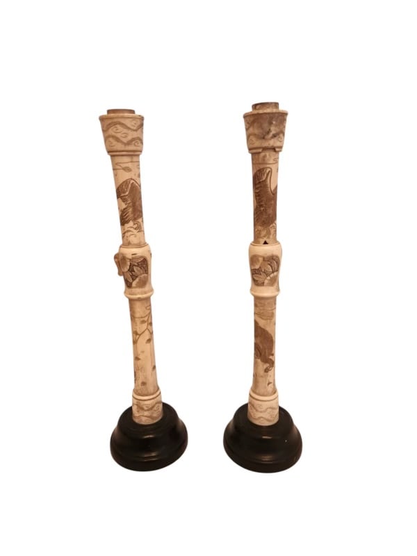 Chinese Hand-Carved Bone Candlesticks Pair: Chinese Hand-Carved Bone Candlesticks Pair Elegant pair of Chinese hand-carved bone candlesticks, featuring intricate designs with traditional motifs. Each candlestick showcases fine detailing and art