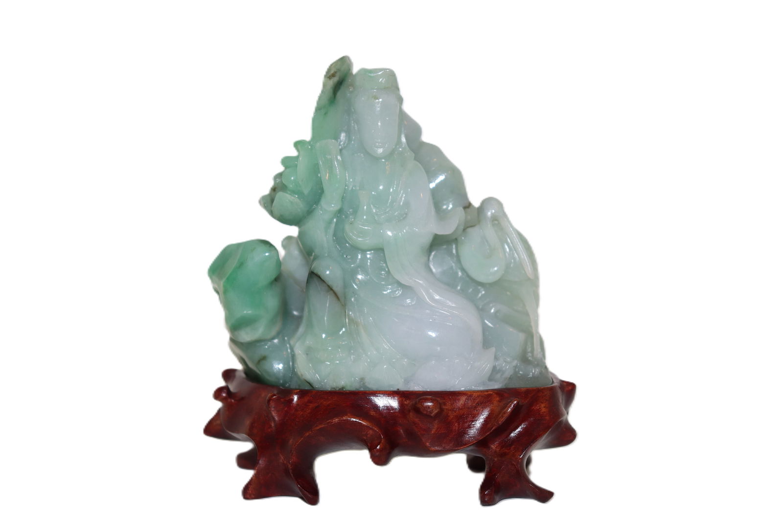 Buddha Jadeite Carving: Buddha Jadeite Carving exquisite jadeite carving depicts the serene and graceful image of Buddha, skillfully crafted from high-quality jadeite stone. The detailed sculpture showcases the Buddha in a s