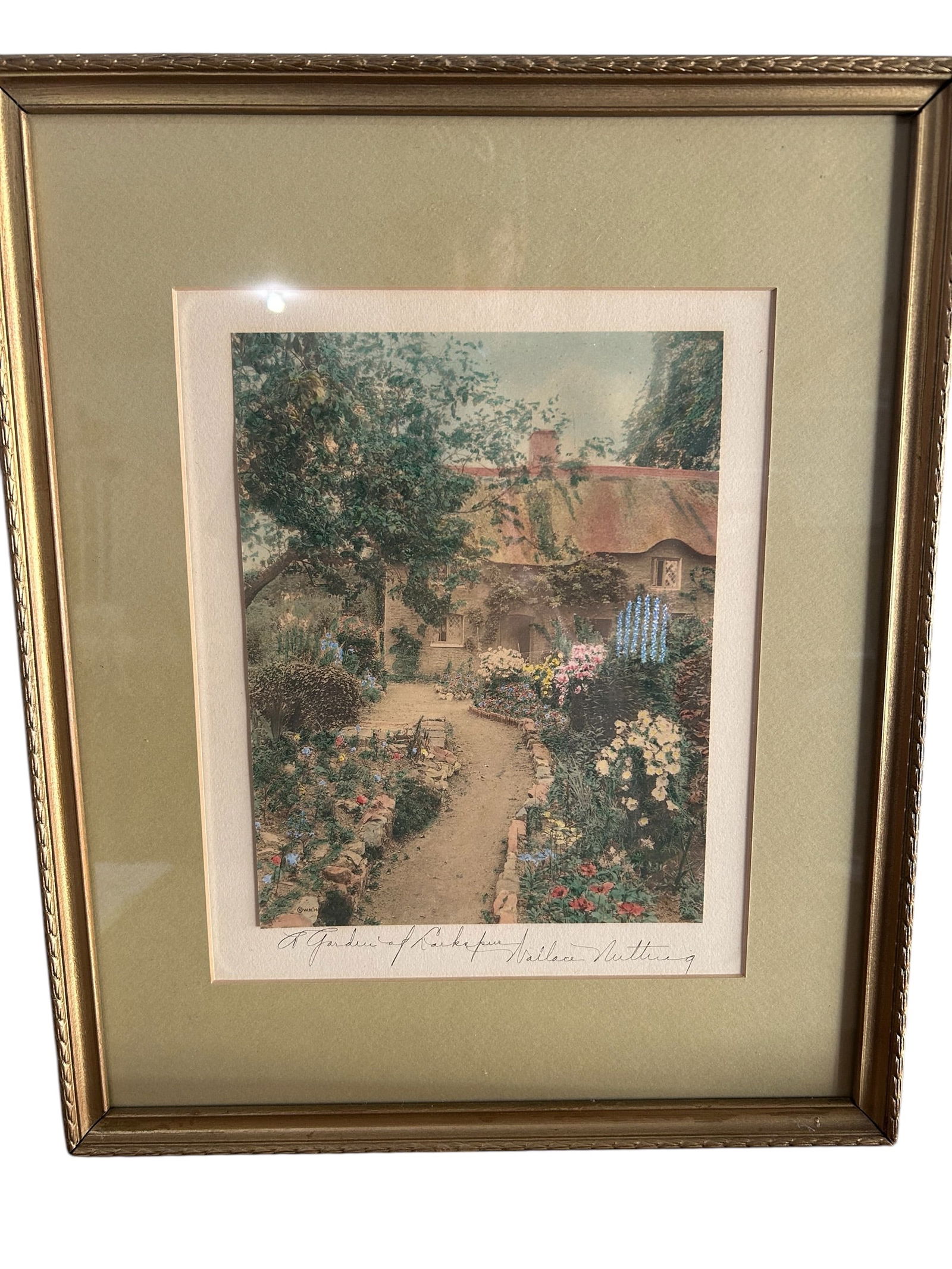 Wallace Nutting - Garden Of Larkspur - Framed Print: Artist: Wallace Nutting Title: Garden of Larkspur Medium: Framed Print Dimensions: 17inH x 14inW Description: Wallace Nutting was a U.S. minister, photographer, artist, and antiquarian, who is most fa