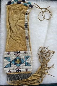 Lakota Beaded Hide Tobacco Bag, Circa 1860 in Display