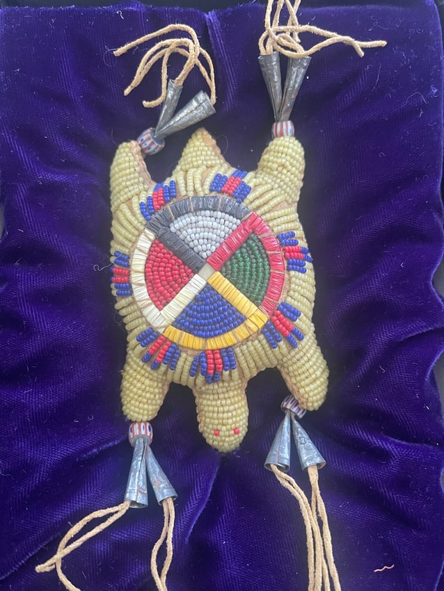 Sioux Native Beaded Turtle Amulet: Native American beaded turtle amulet. These amulets, also known as umbilical cord containers or fetishes, were traditionally made by the mother of a newborn baby. The baby's umbilical cord was placed