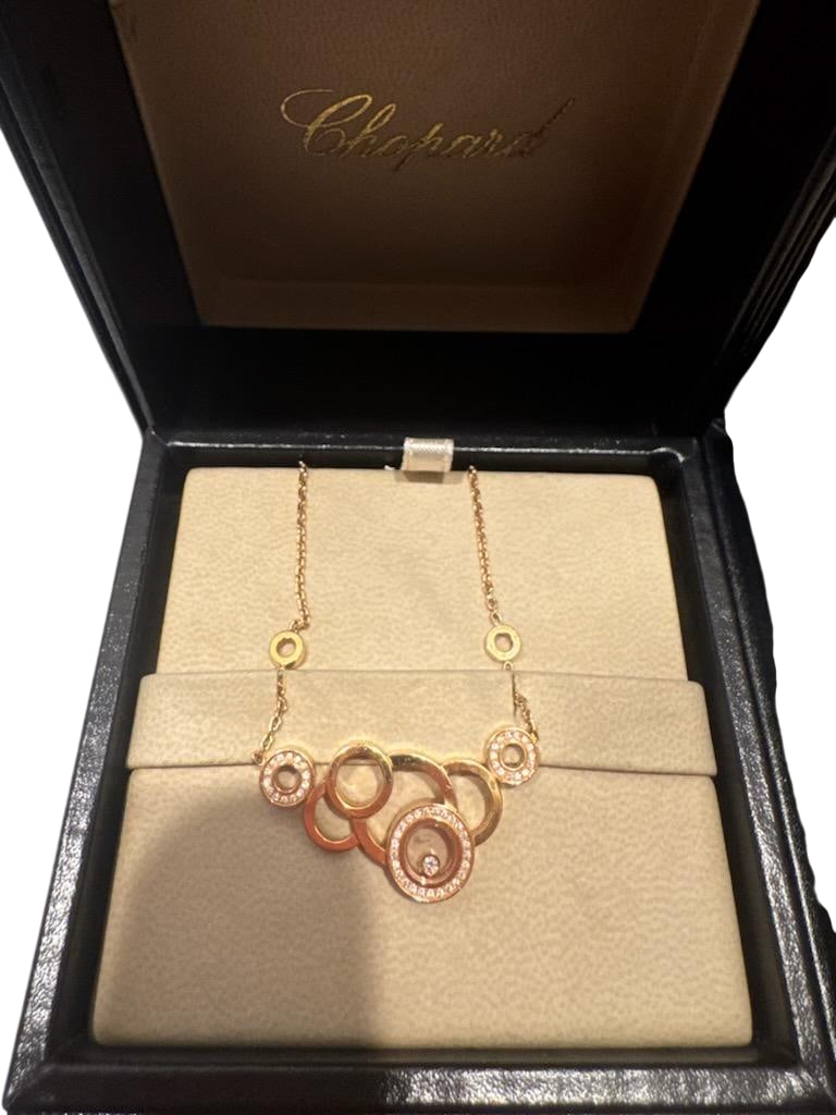 Chopard 18k Rose Gold "Happy Diamonds" Suite: Necklace, Bracelet, & Earrings: Chopard 18k Rose Gold "Happy Diamonds" Suite: Necklace, Bracelet, & Earrings A stunning three-piece jewelry suite by Chopard from their iconic "Happy Diamo