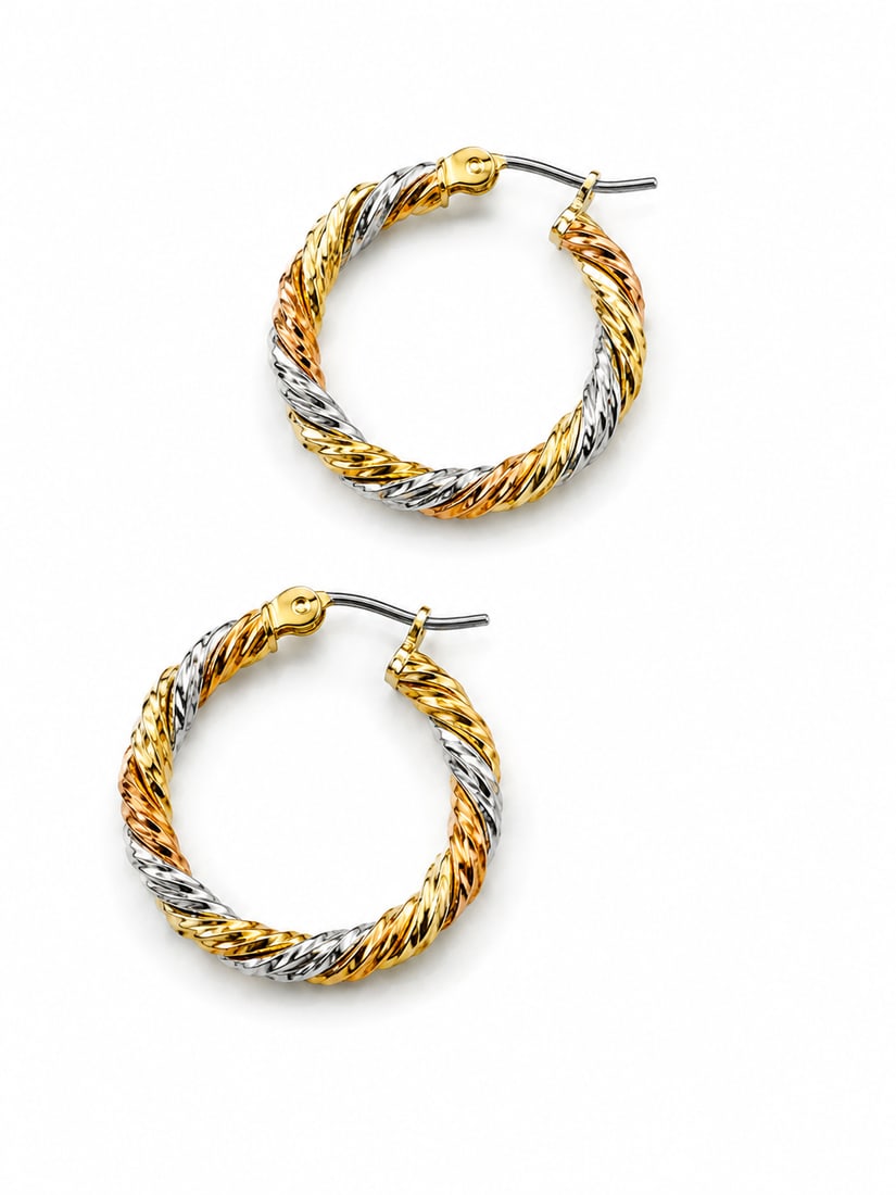 Tri Color Twisted Hoop Earrings: Tri-color twisted hoop earrings featuring gold-tone, silver-tone, and rose gold-tone. Ships from Newport Beach, CA. Proceeds go to Hoag Hospital Charitable Foundation