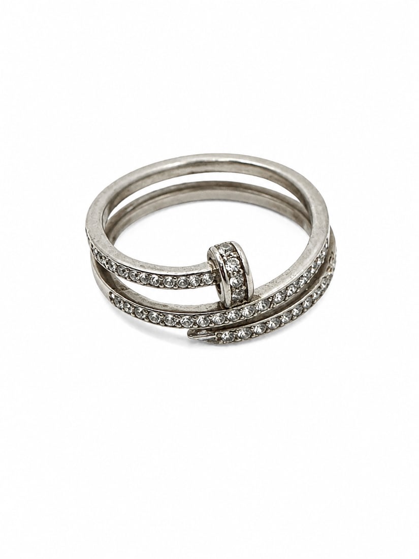 Silver-Tone Nail Wrap Ring with Crystal Accents: Silver-tone nail-inspired wrap ring featuring clear crystal accents and a polished finish. Ships from Newport Beach, CA. Proceeds go to Hoag Hospital Charitable Foundation.