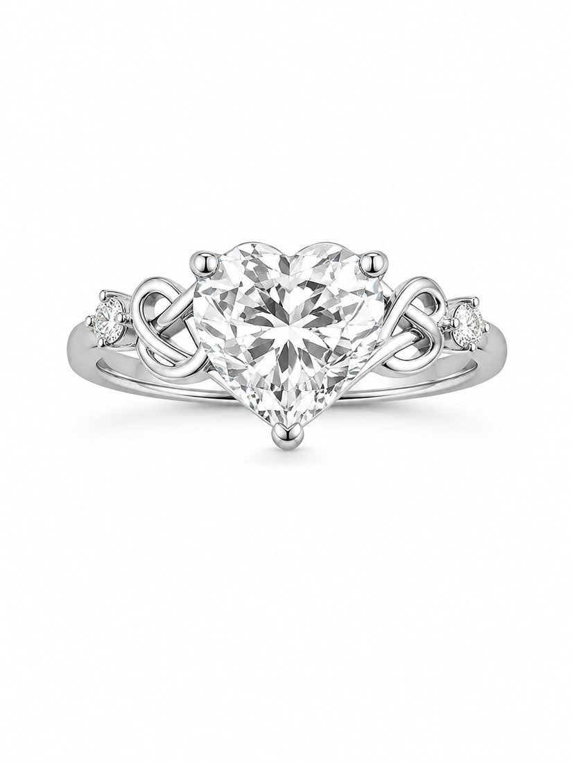 Sterling Silver Heart Ring with Cubic Zirconia Accents: Sterling silver ring featuring a large heart-shaped clear cubic zirconia center stone with smaller clear CZ accent stones on each side. The band includes heart and infinity-inspired detailing. Interio