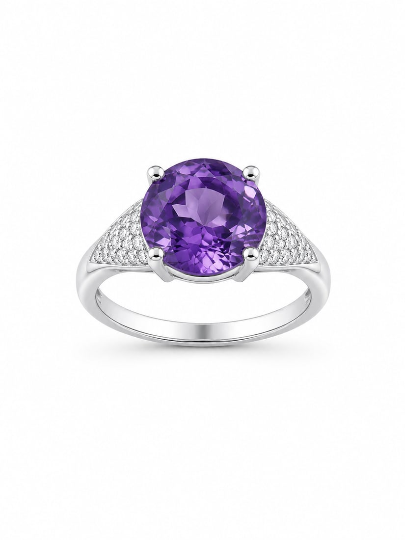 Sterling Silver with Amethyst and Cubic Zirconia Ring: Sterling silver Amethyst and Cubic Zirconia ring featuring a large oval purple center stone with clear accent stones set along both sides of the band. The interior is stamped “925,” indicating