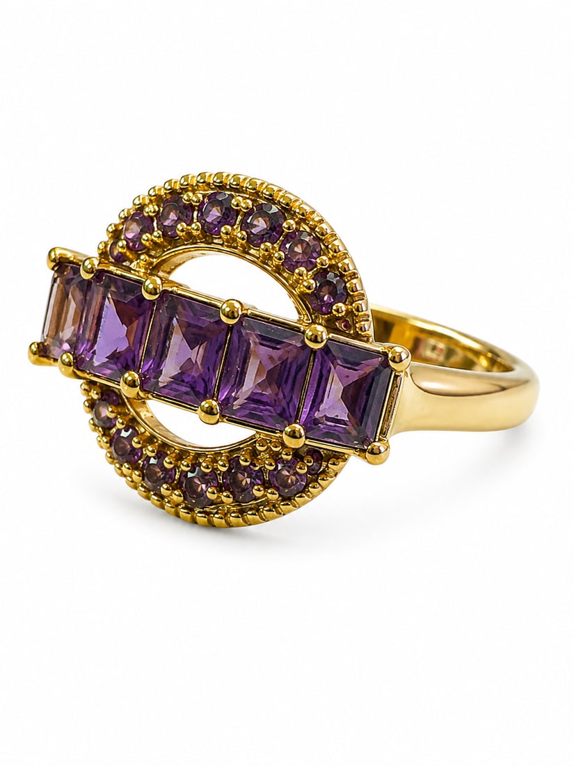 Sterling Gold Ring with Amethyst Stones: Gold finish sterling silver ring featuring a row of rectangular purple stones with an amethyst appearance, surrounded by smaller round purple accent stones in a curved openwork setting. Stamped “925