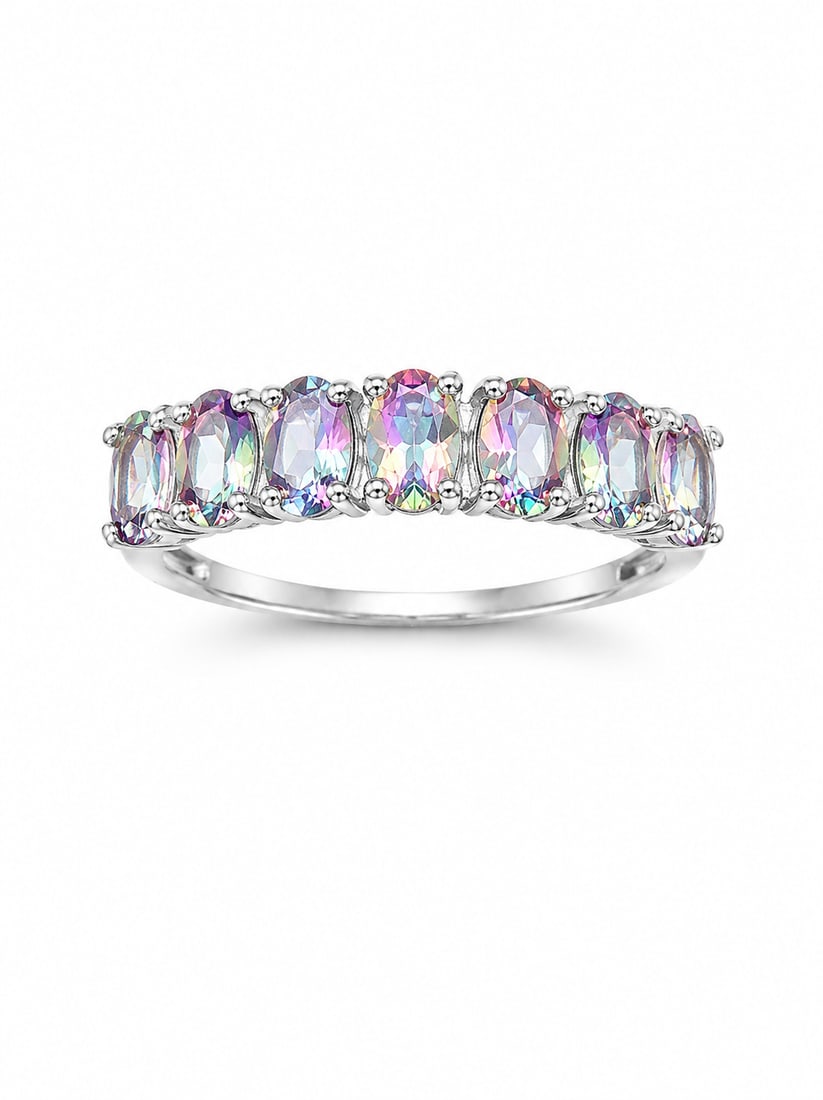 Silver Ring with Mystic Topaz Oval Stones: Silver ring featuring a graduated row of oval faceted stones with a mystic topaz iridescent appearance, displaying flashes of pink, blue, green, and violet across the setting.Ships from Newport Beach,
