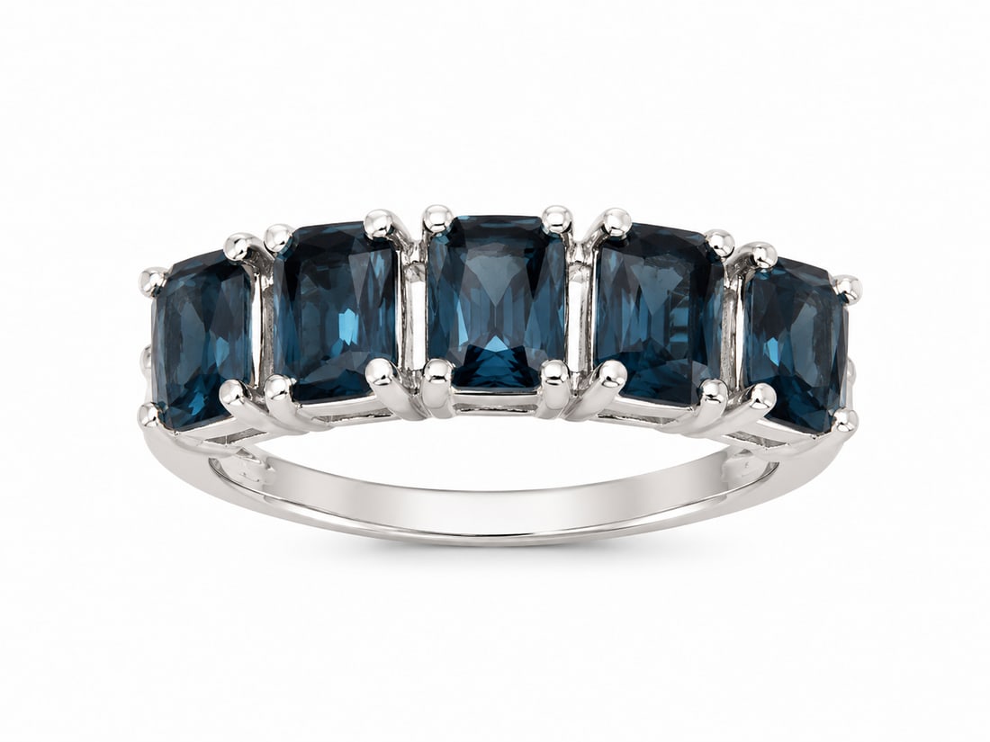 Sterling London Blue Topaz Five-Stone Band Ring: 925 sterling silver ring featuring five rectangular cushion-cut London blue topaz stones arranged across the front of the band. Each deep blue gemstone is individually prong-set, creating a classic