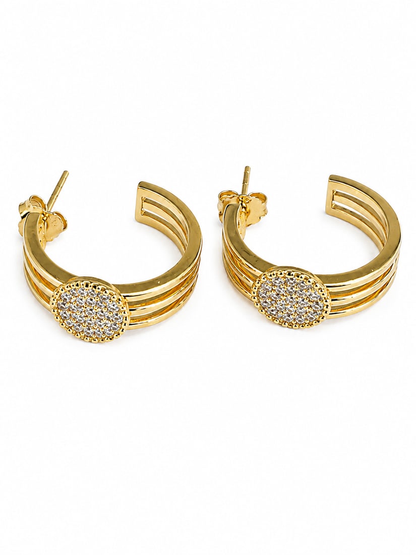 White Stone Gold Multi-Row Hoop Earrings: Gold hoop earrings featuring a sculptural multi-row open design accented by round pavé-set white stone medallions at the front. Finished with post backs for pierced ears. Ships from Newport Beach, CA