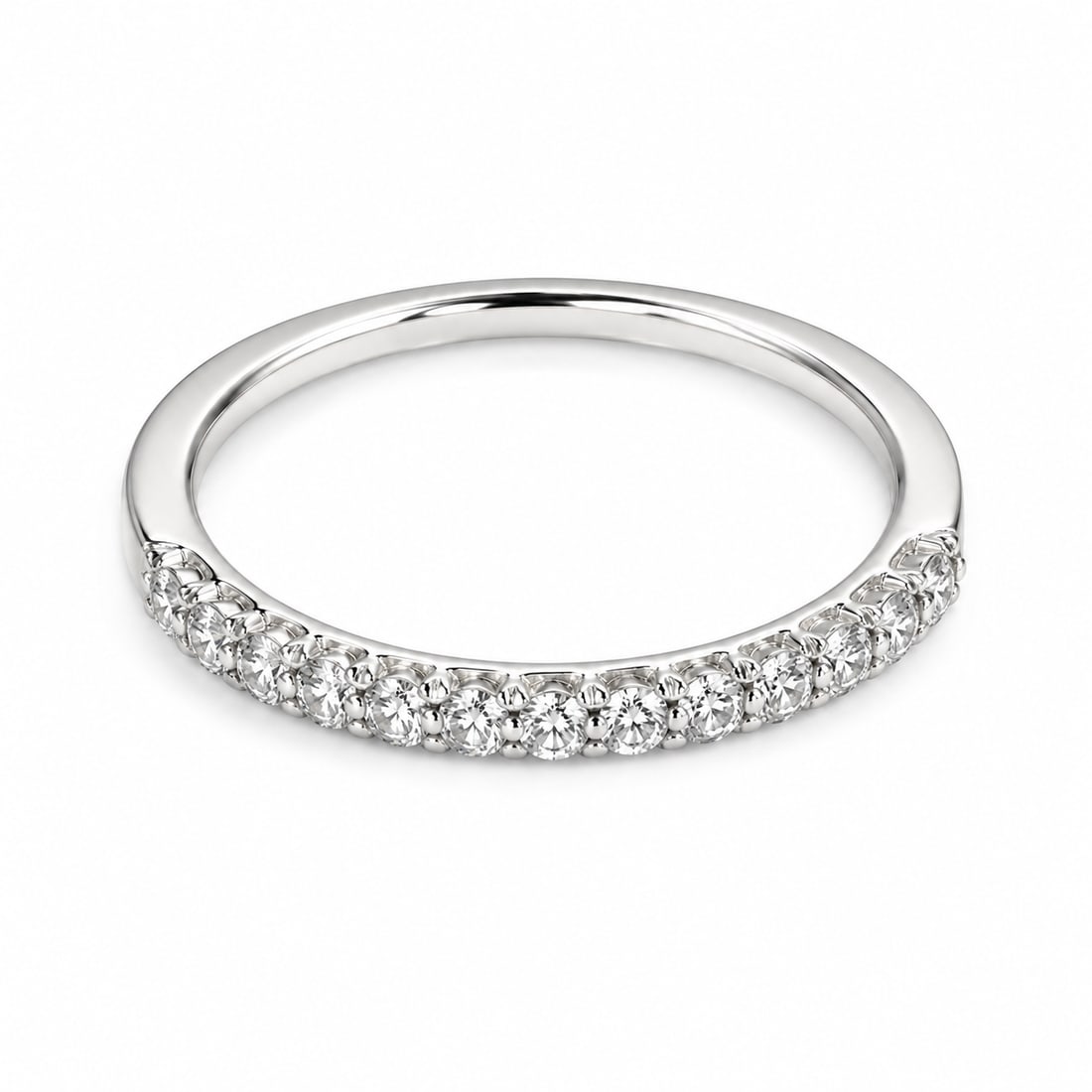 Round CZ Half-Eternity 925 Silver Band Ring: 925 silver band ring featuring a row of round-cut cubic zirconia stones set across the front of the polished band. Classic half-eternity design with a clean, elegant profile. Size 8 and marked 925. Sh