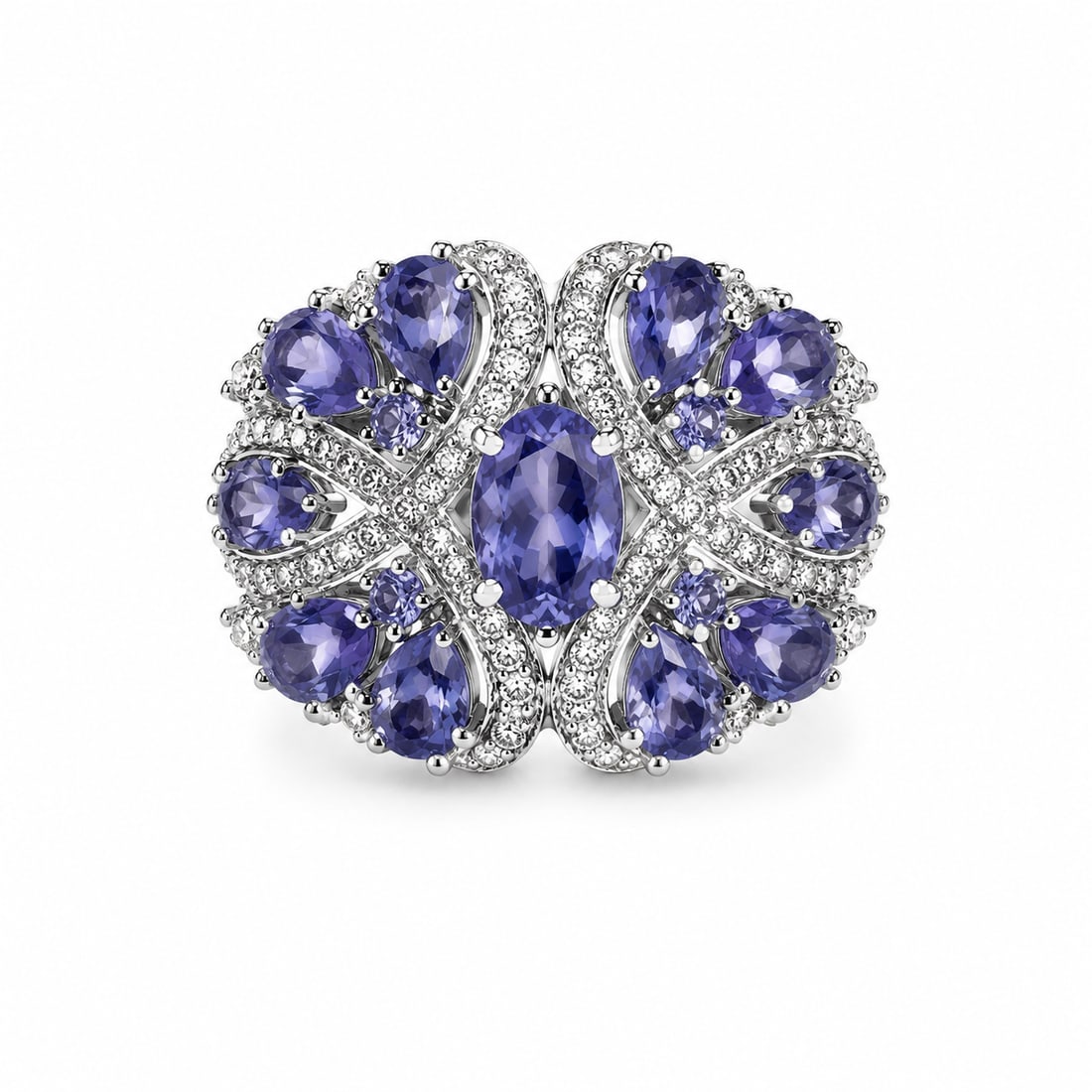 Tanzanite & CZ Sterling Silver Statement Ring: Sterling silver ring featuring a prominent oval tanzanite center surrounded by pear and oval tanzanite stones in an ornate symmetrical arrangement. Accented with round cubic zirconia throughout the