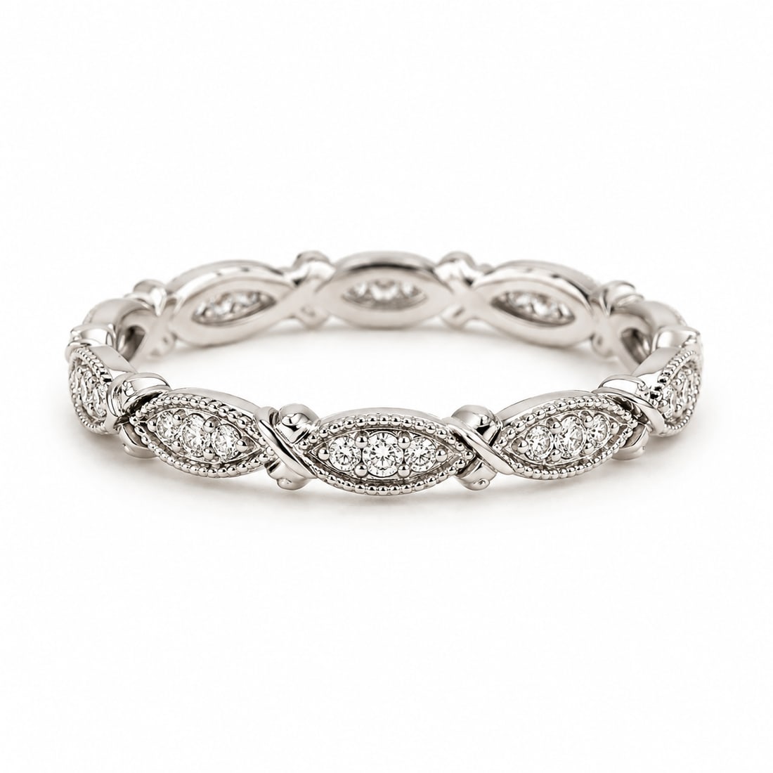 Crystal Twist 925 Gold Ring: Gold ring featuring an elegant twisted band design accented with round crystal stones set throughout the front. The interwoven sections create a braided look with alternating polished gold and