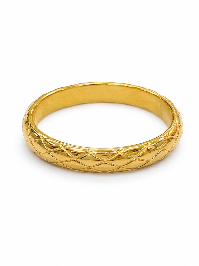 Gold Quilted Pattern Band Ring: Gold band ring featuring a detailed quilted lattice pattern around the exterior. The raised crisscross design creates a textured, dimensional finish with a smooth interior. Ring Size: 8 Ships from New