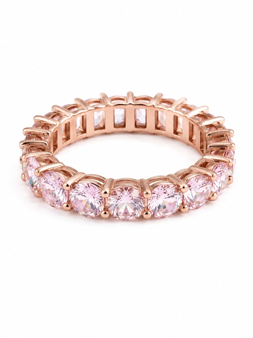 Pink Morganite Rose Gold Eternity Band Ring: Rose gold eternity band featuring a continuous row of pink morganite gemstones. The design combines round and emerald-cut stones, creating a beautiful variation in shape and faceting around the entire