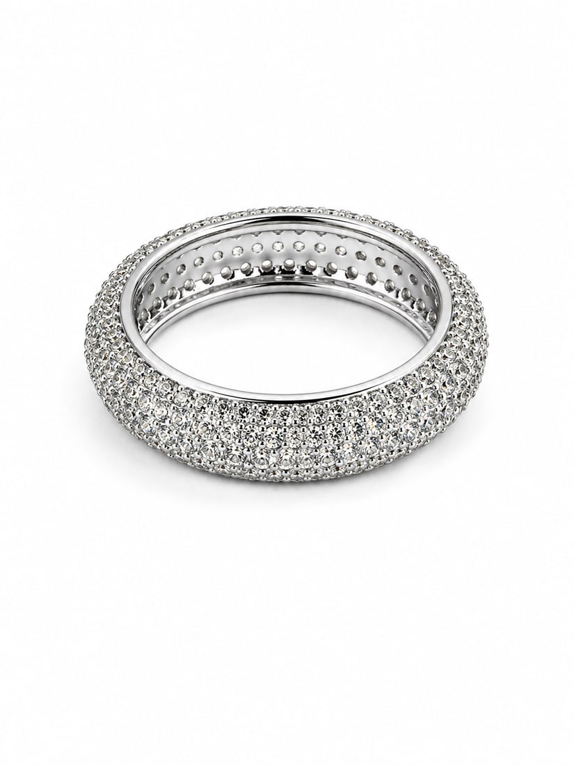 Pavé White Crystal Wide Silver Statement Band Ring: Wide silver ring featuring dense pavé-set white crystals covering the rounded surface for an all-over sparkling finish. The substantial domed band creates a bold statement silhouette while the contin