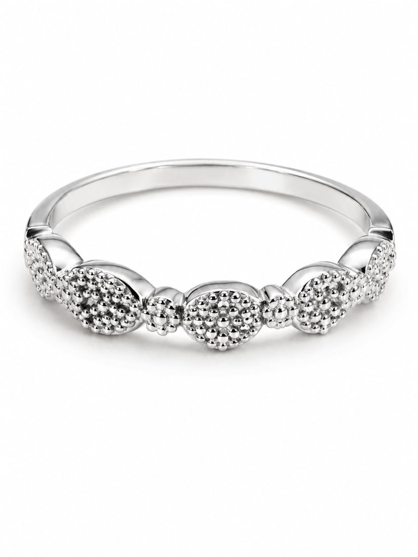 Sterling Beaded Floral Cluster Band Ring: 925 sterling silver ring featuring a decorative band of alternating round floral-inspired clusters with intricate raised bead detailing. The polished silver band and textured dimensional design give t