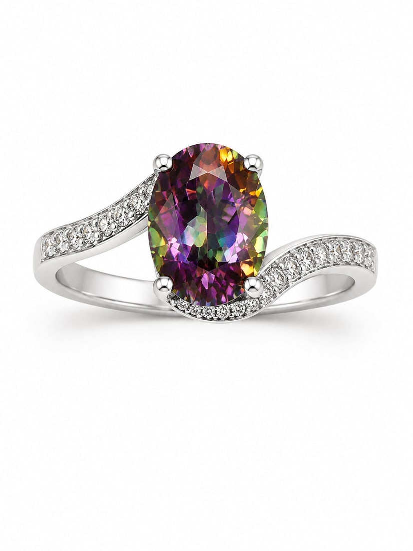 Mystic Topaz Oval Sterling Bypass Ring: 925 sterling silver ring featuring a striking oval-cut mystic topaz centerpiece displaying vivid flashes of purple, green, pink, and gold. The center stone is framed by a graceful sweeping bypass