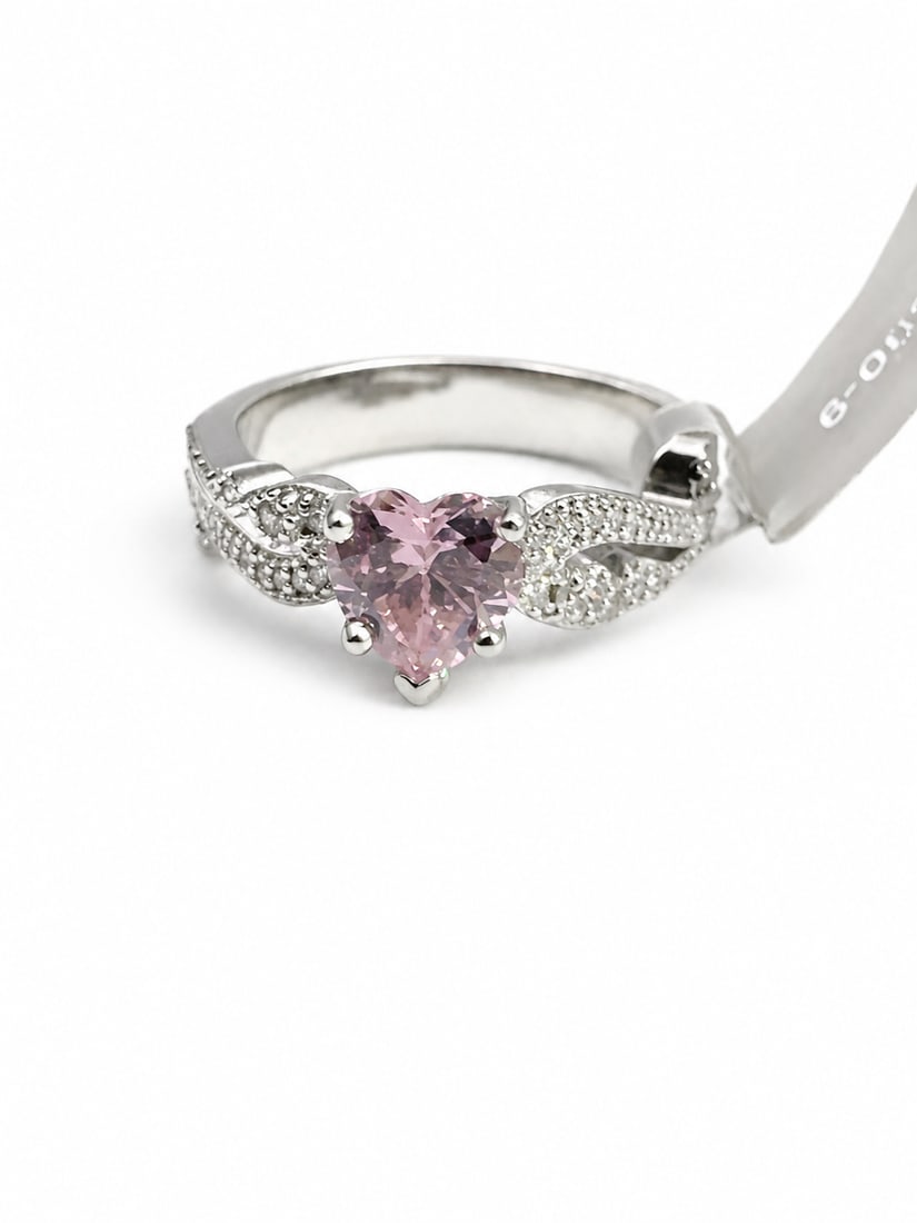 Pink Heart Morganite 925 Sterling Silver Ring: Sterling silver ring featuring a heart-cut pink morganite center stone in a romantic solitaire design. The split infinity-style shoulders are accented with sparkling white CZ stones for an elegant