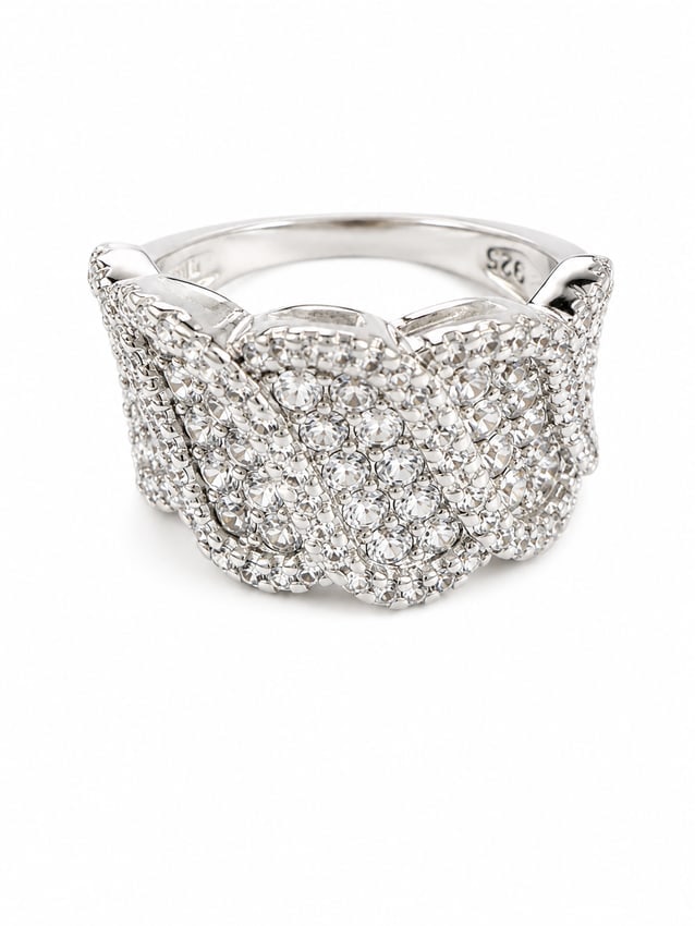 Sterling Crystal Statement Ring: 925 sterling silver statement ring featuring an ornate layered design covered in sparkling round crystal accents. The overlapping curved sections create a bold, dimensional look across the front of th