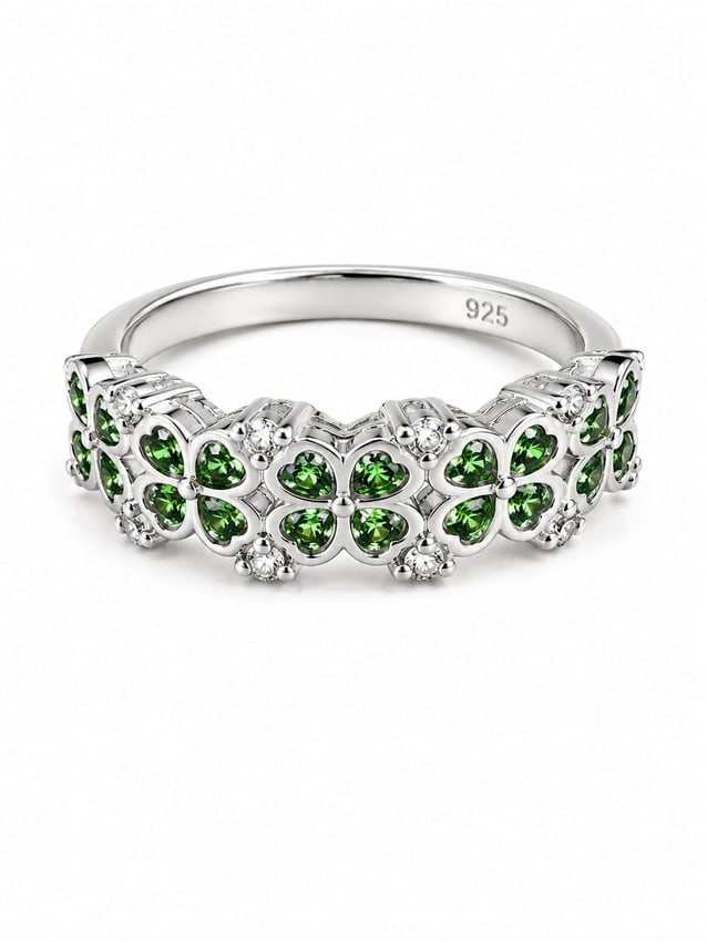 Sterling Green Tsavorite & Crystal Floral Band Ring: 925 sterling silver ring featuring a beautiful floral design accented with vivid green tsavorite stones arranged into delicate four-petal flowers. Sparkling white crystal accents are set throughout