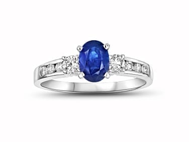 Oval Sapphire and Diamond Engagement Ring in 14K White Gold over Silver: Oval Sapphire & Diamond Ring A stunning engagement-style ring featuring a 7x5mm oval sapphire center stone surrounded by sparkling diamond accents in 14K white gold over sterling s