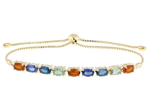 4.54ctw Multi-Color Kyanite Bolo Bracelet in 18K Yellow Gold over Silver: 4.54ctw Multi-Color Kyanite Bolo Bracelet A unique 4.54ctw assortment of multi-color kyanite set in an adjustable 18K yellow gold over sterling silver bolo bracelet. Ships from Newport Beach, CA.