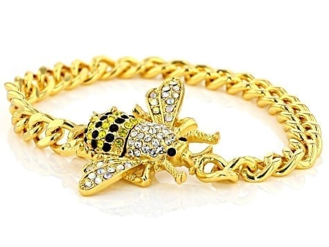 Multi-Color Crystal Bee Bracelet in Gold-Tone: Multi-Color Crystal Bee Bracelet A whimsical and charming gold-tone bracelet featuring a bee motif adorned with sparkling multi-colored crystals. Ships from Newport Beach,