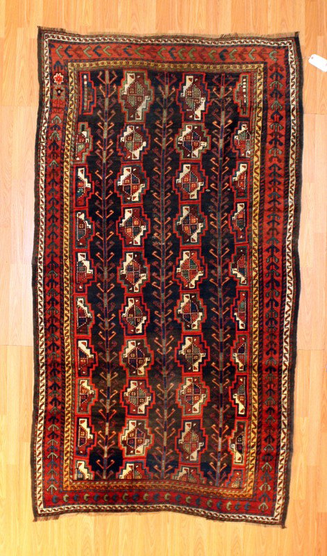 4'6" x 8'3" Baluch: Fine Persian antique; retail value 1,500.