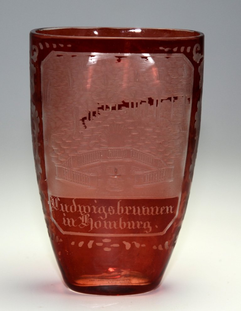 Pocket Spa Beaker: Clear glass ruby stained and wheel-cut. Engraved scene of Homburg. 4.25"ht., Bohemian, circa 1875.