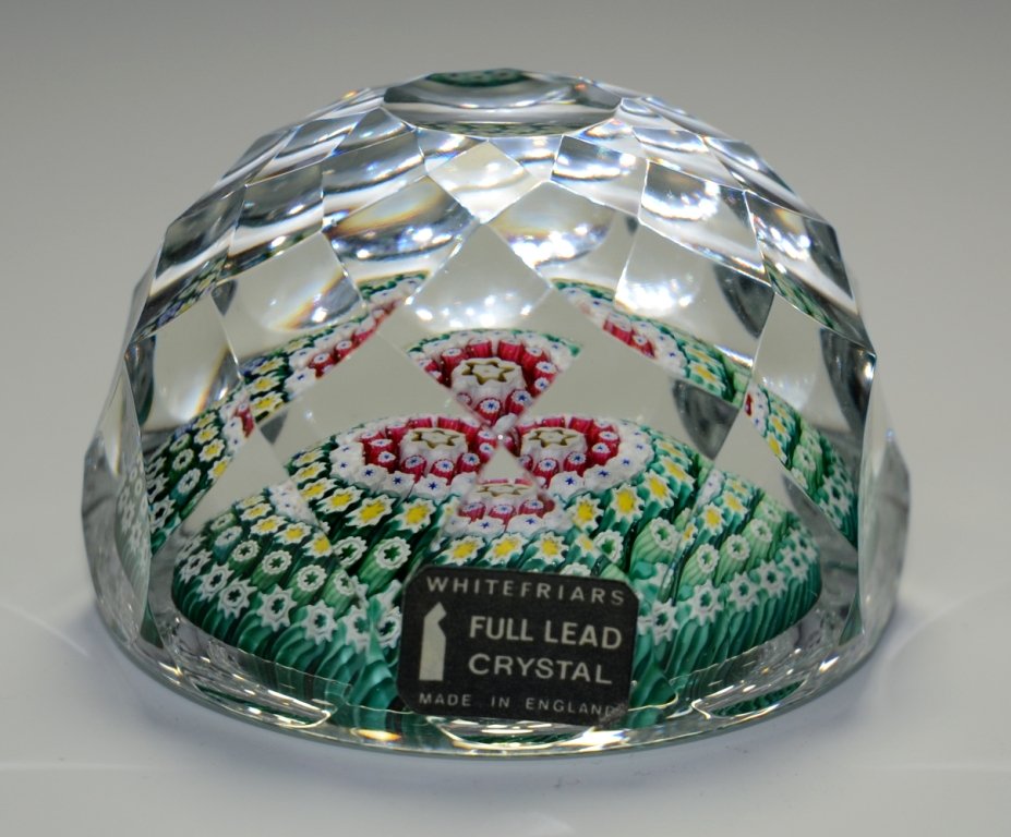 Whitefriars Paperweight: Clear glass over millefiori base. Whitefriars, England, circa 1978.