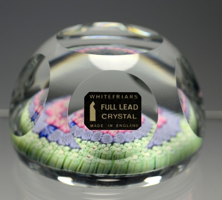 Whitefriars Paperweight: Clear glass over millefiori base. Whitefriars, England, circa 1978.