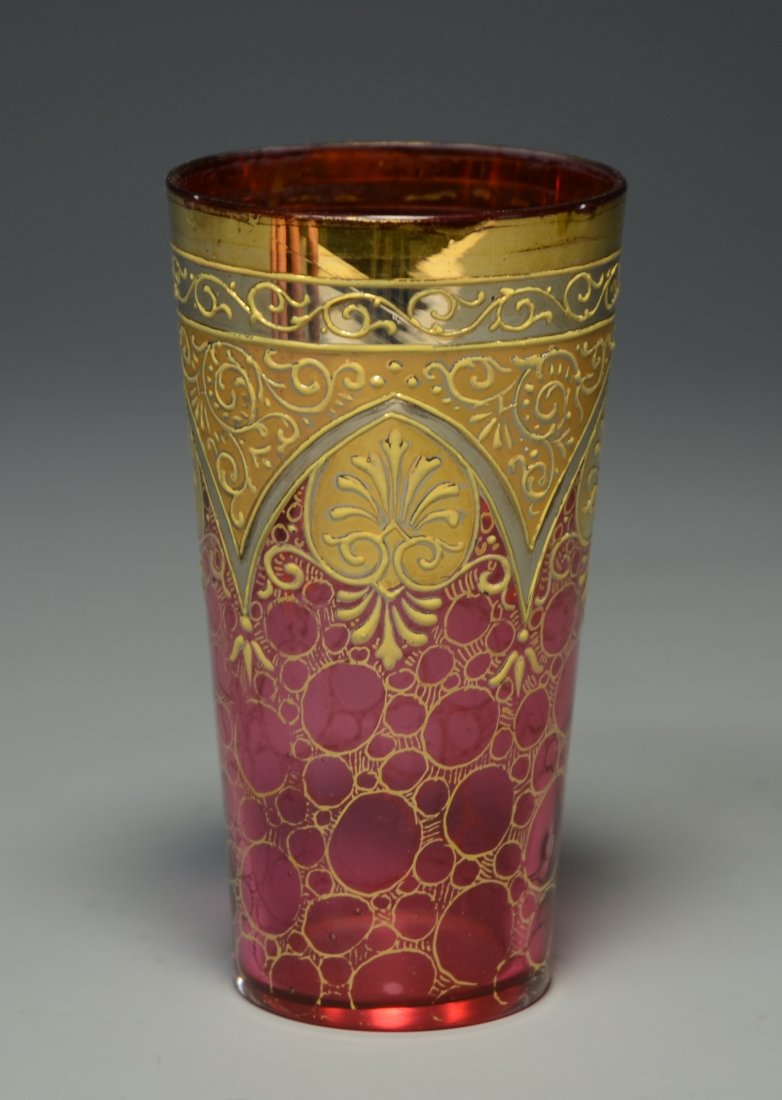 Juice Glass: Clear glass cased with red and enameled decoration with gilding. 4.0"ht., Moser, circa 1900.