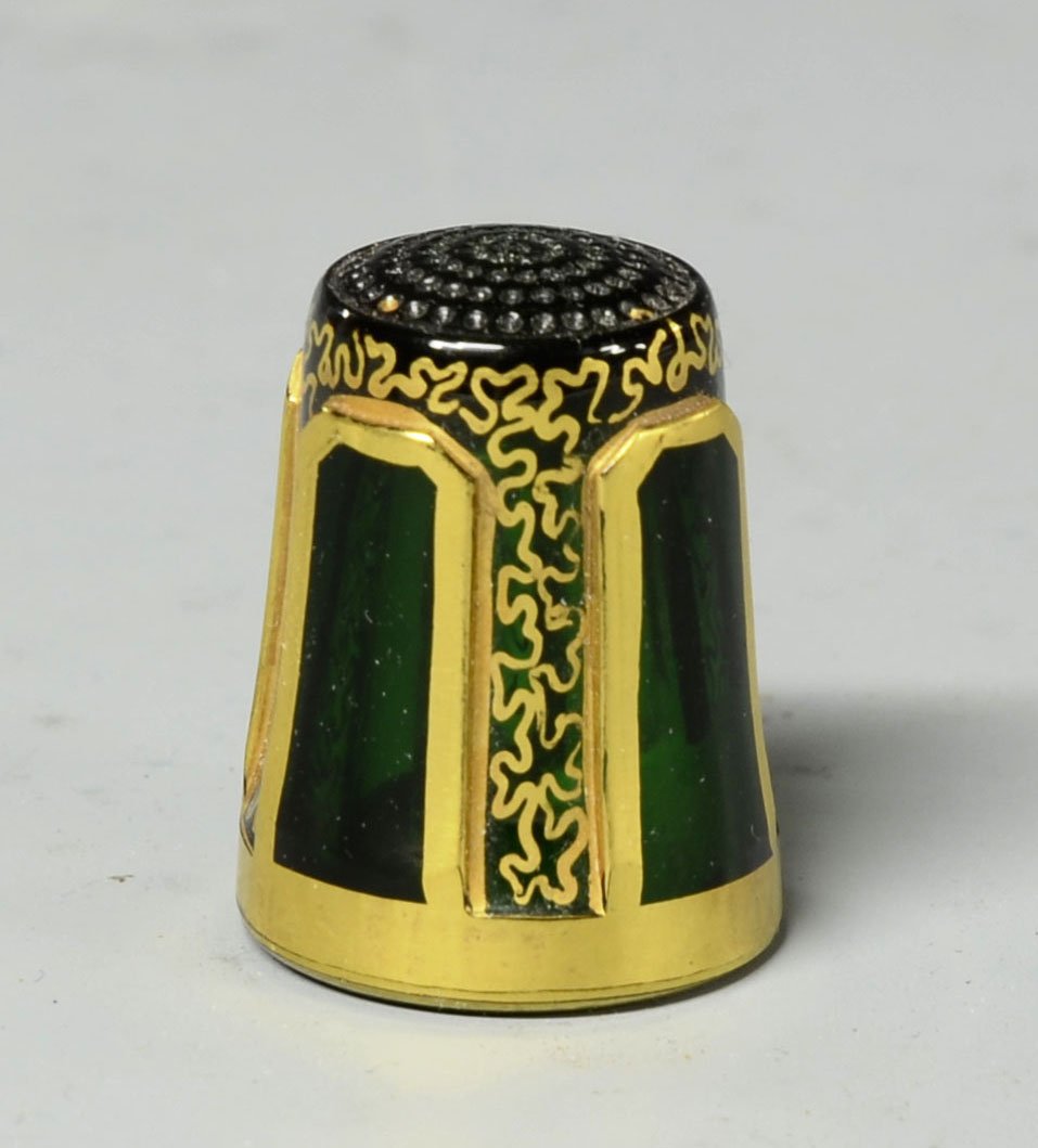 Bohemian Glass Gilded Thimble: Green glass thimble, 1.25" ht., four raised panels gilded design. Unusual, Bohemain, circa 1920.