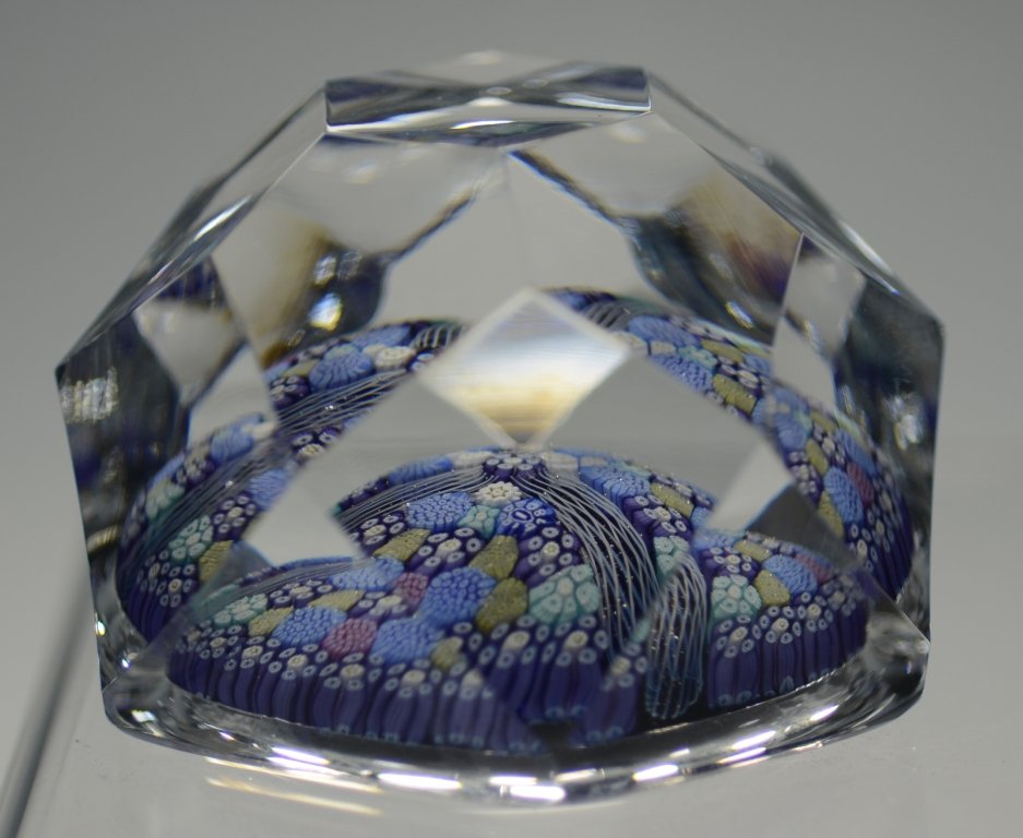Whitefriars Paperweight: Clear glass over millefiori base. Whitefriars, England, circa 1978.