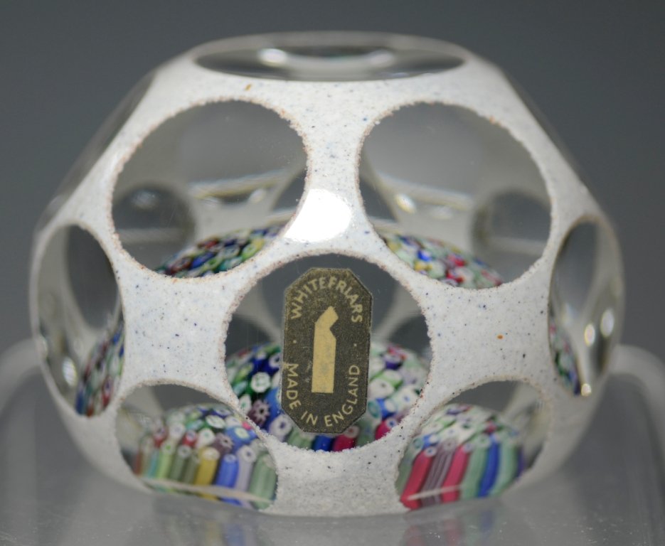 Whitefriars Overlay Paperweight: White with black specks over clear over a millefiori base. Whitefriars, England, circa 1974.