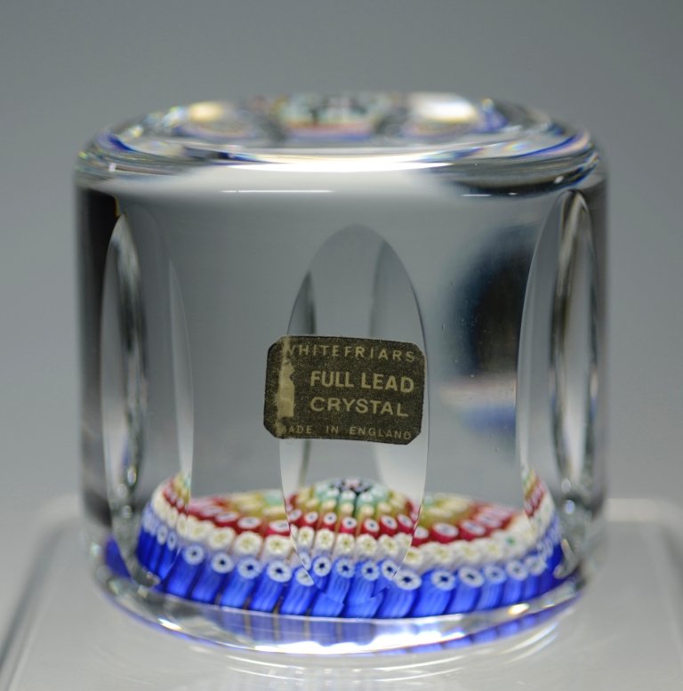 Whitefriars Paperweight: Clear glass over millefiori base. Whitefriars, England, circa 1972.