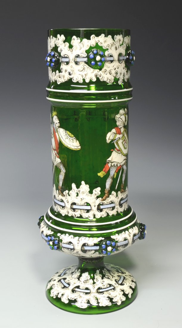 Fabulous Enameled Pokal: Blown, green glass pokal with applied prunts. Enamel decoration of two knights fighting. 13.5"ht., by, Anton A. Egermann, Haida, circa 1890.