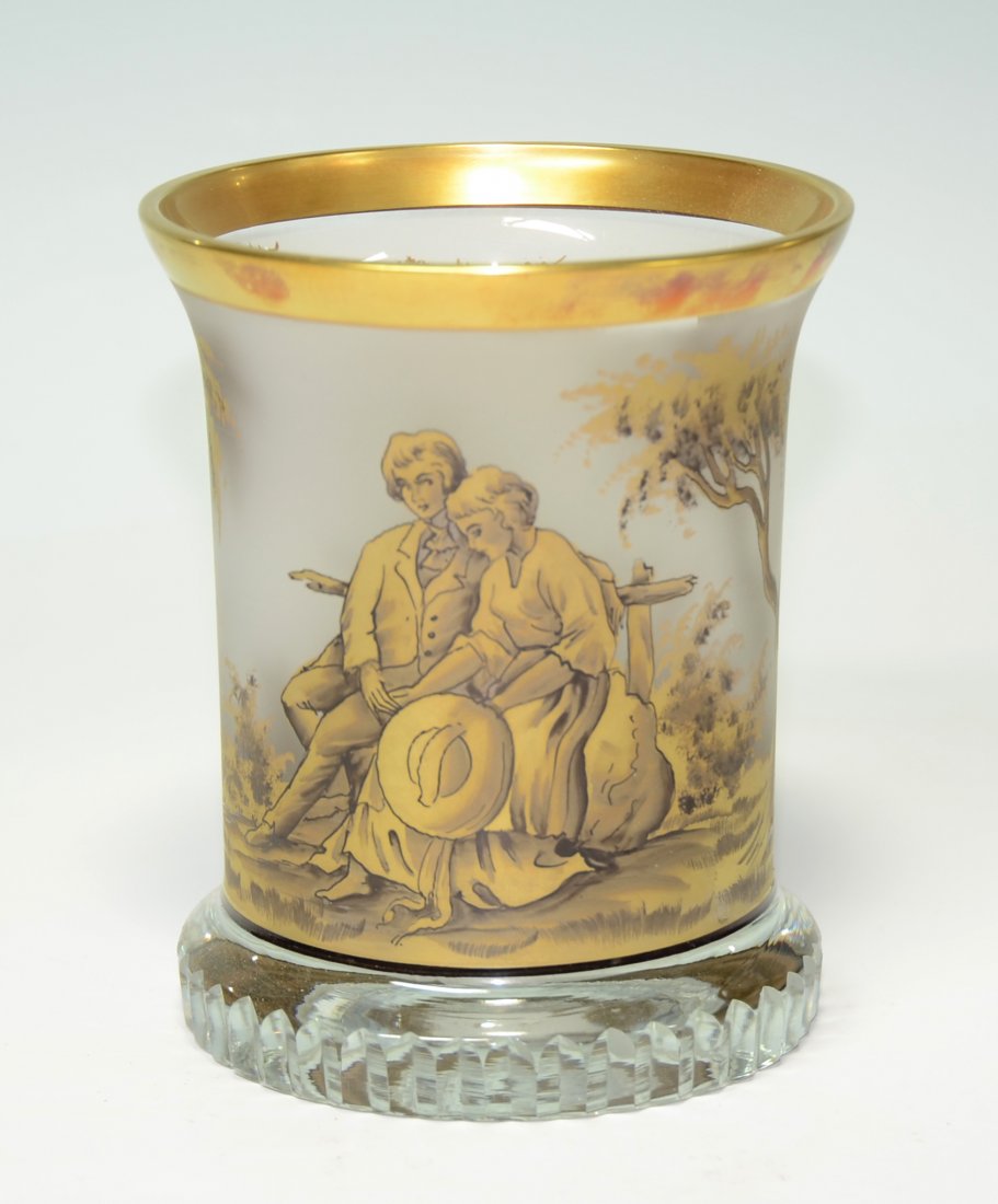Enameled Beaker: Blown clear glass. Decorated with gold and black enamel. Courting scene. 5.0"ht.,German or Czech, circa second half 1900's. Signed W. Herrmann