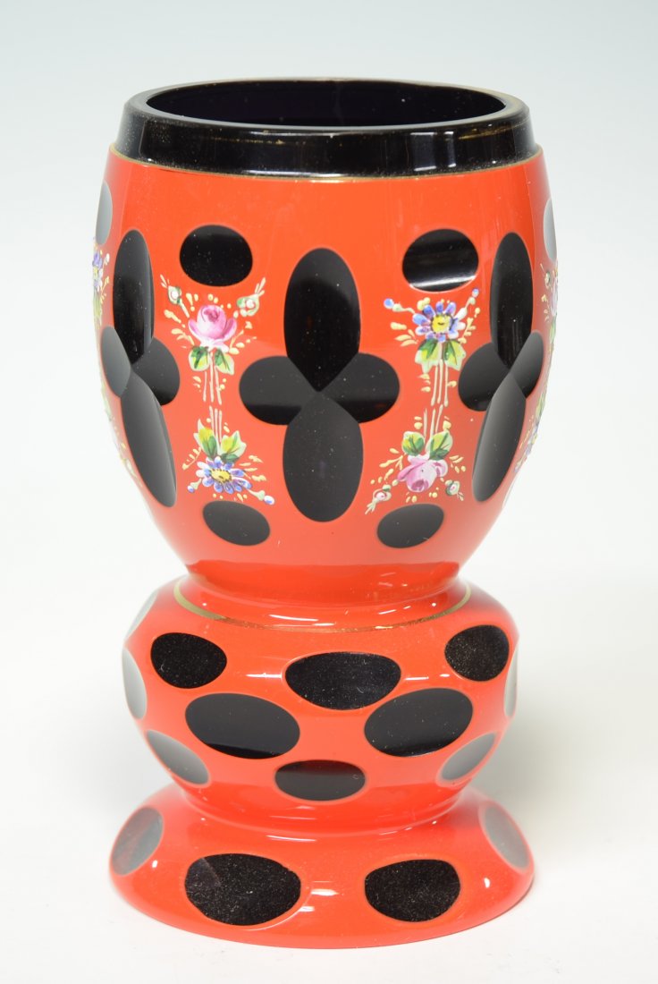 Double Overlay Beaker: Blown, orange-red over clear over amethyst glass beaker with decorative facet-cuts to clear. Floral enamel and gild decoration. 6.0"ht., Bohemian, circa 1900's.