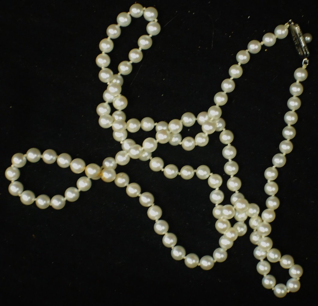 Mikimoto Pearl 31 ½” Necklace with silver clasp: Mikimoto Pearl 31 ½” Necklace with silver clasp. Original box