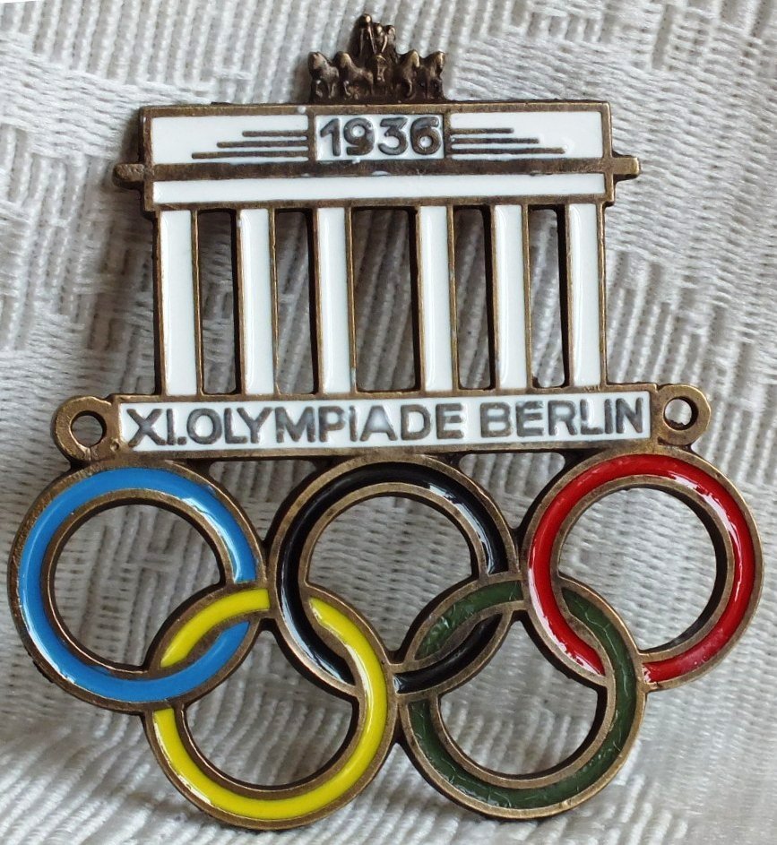 German 1936 Olympic Game plaque: German 1936 Olympic Game plaque. Unusual, probably designed for office dorr or a car.
