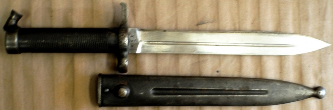 Swedish WWII Mauser Bayonet with sheath: Swedish WWII Mauser Bayonet with sheath, marked, used in Swedish army in 1940’s. 14” overall