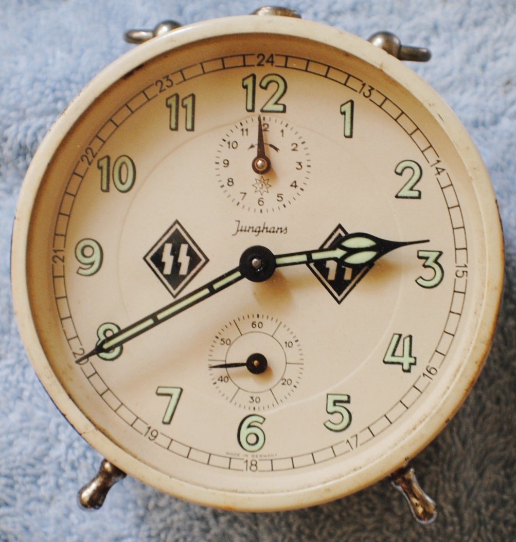 German Nazi SS alarm clock: German Nazi SS alarm clock. Authenticity and age unknown, please do your own expertize and bid accordingly