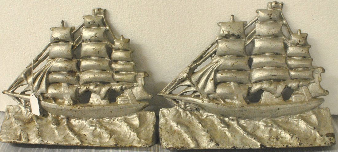 Pair of 1925 A.M. Greenblatt Studio doorstops: Pair of 1925 A.M. Greenblatt Studio doorstops 9 3/4" tall, projection 12" x2 1/4". Marked