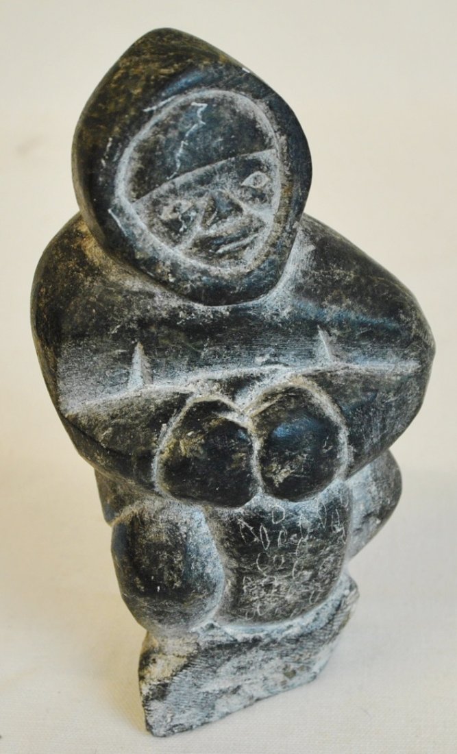 Inuit carving: Inuit carving. Numbered on the bottom 779. 5 3/4" tall, 3" wide, 2 1/4" deep, weights 1.8 lb l