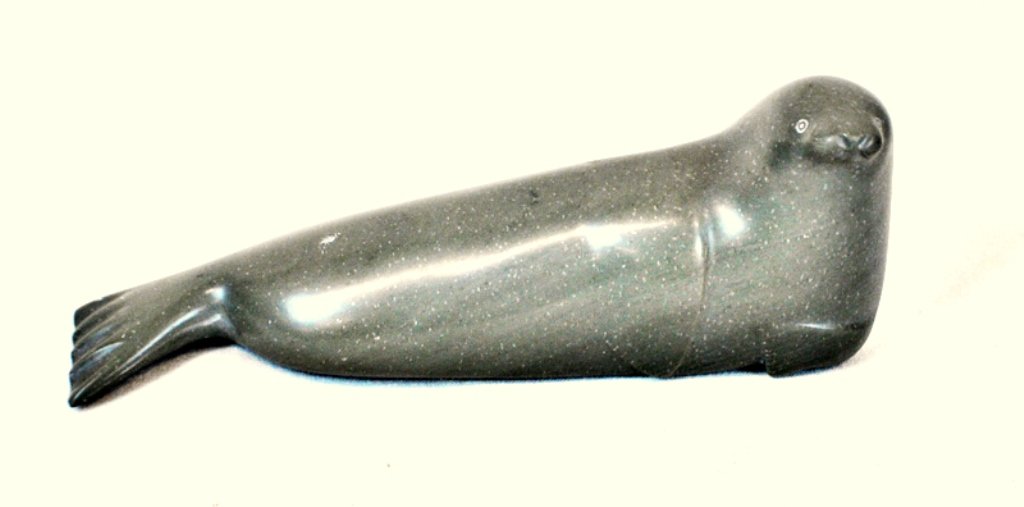 Inuit sculpture: Inuit sculpture 9" x 3 3/8" x 2 1/4"